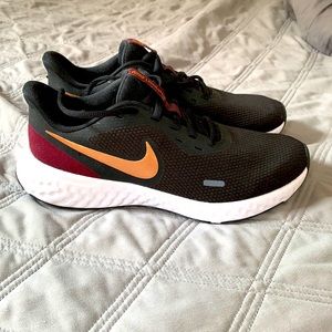 Nike Revolution sneakers, size 8.
